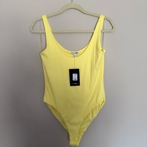 Fashion Nova Yellow One-Piece bodysuit